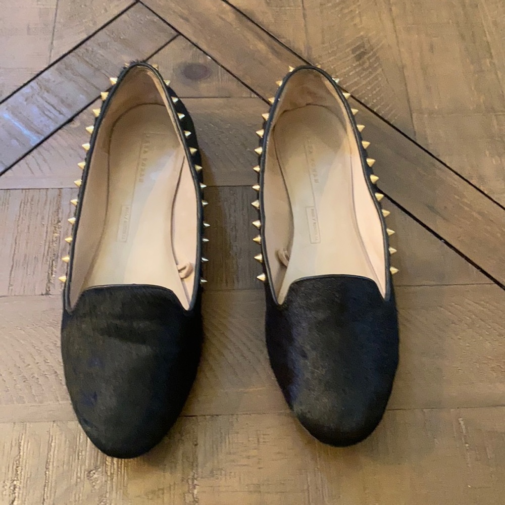 Zara women flats black pony hair with gold studs.